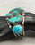 vintage hefty handmade turquoise bracelet, seven gorgeous turquoise cabochons, four wire conjoined terminal
