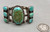 great antique seven stone turquoise bracelet, large center natural turquoise cabochon displayed in a smooth silver bezel, six matching natural turquoise cabochons, twisted wire and raised dots