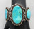 hefty older three stone turquoise bracelet, three larger natural turquoise cabochons, three wire terminal