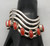coral cuff bracelet, award winning artist Na Na Ping, modernistic wave design, 8 coral cabochons, handmade bezels