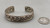 older handmade coin silver marked bracelet, carinated bands with conjoined ends, center twisted wire, hand stamped designs