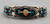 1940s inlay design, cupids arrow design, mother of pearl, turquoise and spiny oyster inlay, attributed to John Gordon Leek