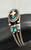1940s inlay design, cupids arrow design, mother of pearl, turquoise and spiny oyster inlay, attributed to John Gordon Leek