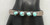 ingot bracelet, four turquoise cabochons, circa 1920s to 1930s, handmade sawtooth bezels, raised dot accents, hand stamped designs, solid cuff