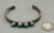 ingot bracelet, four turquoise cabochons, circa 1920s to 1930s, handmade sawtooth bezels, raised dot accents, hand stamped designs, solid cuff