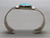 1930s, central turquoise cabochon, hand stamped designs, smooth silver cuff