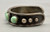 5 green turquoise stones, darkened silver background, silver dots