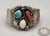 turquoise, coral, and mother of pearl, leaf and wire appliques, four wire terminal with triangular wire