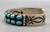hefty two row turquoise bracelet,  deep stamping, darkened silver background, smooth silver cuff