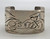 hefty sterling silver bracelet, stamping inside and outside of cuff, motorcycle and flame design, northwest coast origin