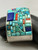 unique cobblestone bracelet, coral, turquoise, and lapis, solid cuff, chain guard