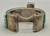 cobblestone inlay bracelet, amethyst, coral, turquoise, and lapis, hefty solid cuff with chain guard