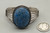 central denim lapis cabochon, seven wire terminal, Cecil Henry