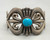 tufa cast, E.S. Mitchell, central turquoise, hand stamped designs