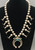 Circa 1920s to 1930s, 2 wire naja, four petal blossoms,