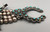 snake eye/dot turquoise, 20 cabochons, 12 blossoms, handmade silver beads, circa 1940s to 1950s