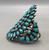 natural turquoise, cluster, darkened silver background, three wire terminal, circa 1950s