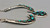 bib style design, natural turquoise, darkened background, handmade silver link chain, Martha Willeto
