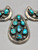 bib style design, natural turquoise, darkened background, handmade silver link chain, Martha Willeto