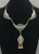 needlepoint turquoise, bib style, central pendant, silver dangles, silver link chain, Jimmie Yazzie, Navajo
