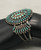 needlepoint and dot turquoise, Elizabeth Cooche, Zuni, three wire terminal