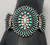 needlepoint and dot turquoise, Elizabeth Cooche, Zuni, three wire terminal