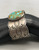 vintage sterling silver bracelet, large webbed turquoise cabochon, hand stamped designs, scalloped edges