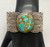 vintage sterling silver bracelet, large webbed turquoise cabochon, hand stamped designs, scalloped edges