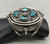 vintage, spinner bracelet, Bisbee turquoise, pictorial inlay, overlay style setting, three wire terminal
