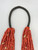 21 strand, coral and gold beads, black Pueblo wrap,