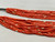 21 strand, coral and gold beads, black Pueblo wrap,
