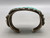 vintage, natural turquoise, cluster,  darkened silver background, three wire terminal