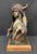 Sees Enemies Afar Bronze By Ken Payne vigilant warrior, clutching telescope