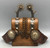 fancy California style spurs, leather spur straps, single mounted, iron work, 14 point rowels, turned down shanks, chap guards, engraved silver buttons, incised silver, original heel chains,