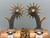 fancy California style spurs, leather spur straps, single mounted, iron work, 14 point rowels, turned down shanks, chap guards, engraved silver buttons, incised silver, original heel chains,
