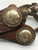 fancy California style spurs, leather spur straps, single mounted, iron work, 14 point rowels, turned down shanks, chap guards, engraved silver buttons, incised silver, original heel chains,