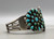 natural turquoise, cluster bracelet, petit point and dot turquoise, darkened silver backgrounds, three wire terminal, Zuni, Circa 1920s