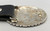 storyteller, eight conchos, silver and bronze overlay, etched technique, textured and darkened background, black leather belt, Calvin Peterson,