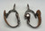 Ray Anderson, swan neck spurs,, engraved silver appliques, diamond shape incised silver plates, silver heel buttons, basket weave pattern.