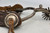 Spanish Style, drop shanks, silver mountings, single mounted, silver engraved concho style button, stamped designs,twisted rope edging, 16 point rowels, Circa early 1900s