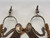 Spanish Style, drop shanks, silver mountings, single mounted, silver engraved concho style button, stamped designs,twisted rope edging, 16 point rowels, Circa early 1900s