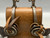 Spanish Style, drop shanks, silver mountings, single mounted, silver engraved concho style button, stamped designs,twisted rope edging, 16 point rowels, Circa early 1900s