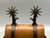 California style spurs, chap guards, inlaid silver, silver dot accents, concho style button, bucking horse figure, hell chains, leather straps, Circa late 1800s to early 1900s.