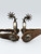 California style spurs, Hernandez Brothers, silver engraved inlays, chased designs, heel chains, chap guards, drop shank, Circa late 1800s to early 1900s