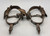 California style spurs, silver mountings, leather straps, single mounted spurs, engraved silver, inlaid silver strips, 10 point rowel,  Circa early 1900s
