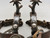 California style spurs, silver mountings, leather straps, single mounted spurs, engraved silver, inlaid silver strips, 10 point rowel,  Circa early 1900s