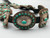 green turquoise, Marcella James, sawtooth bezes, handstamped designs, rounded centers,  scalloped edges,  repousse