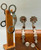 Lady Leg, Walt Rambo, stamped silver overlay, copper garter, silver and copper mountings, clover leaf rowels, Austin, TX