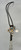 Zuni-made bolo tie with Buffalo Dancer design from 1930s to 1970s