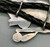 Zuni-made bolo tie with Buffalo Dancer design from 1930s to 1970s